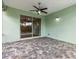 Covered patio with paver floor, pool view, and ceiling fan at 597 Lost Shaker Way, Daytona Beach, FL 32124