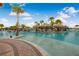 Large resort-style pool with multiple seating areas at 597 Lost Shaker Way, Daytona Beach, FL 32124