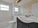 Bathroom with tub, toilet, and vanity at 605 Brightview Dr, Lake Mary, FL 32746