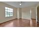 Bright bedroom with wood flooring and large window at 605 Brightview Dr, Lake Mary, FL 32746