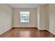 Bedroom with wood floor and window at 605 Brightview Dr, Lake Mary, FL 32746