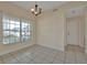 Bright dining room with tiled floor and chandelier at 605 Brightview Dr, Lake Mary, FL 32746