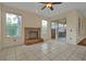 Gathering room featuring fireplace and sliding glass doors at 605 Brightview Dr, Lake Mary, FL 32746