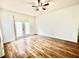 Living room with hardwood floors and ceiling fan at 6356 Raleigh St # 1503, Orlando, FL 32835