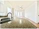 Bright living room with hardwood floors and french doors at 6356 Raleigh St # 1503, Orlando, FL 32835