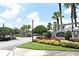 Landscaped entrance to Courtney Landing Condominium at 6554 Swissco Dr # 53, Orlando, FL 32822