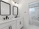 Elegant bathroom with double vanity and a shower/tub combo at 6921 Arnoldson St, Orlando, FL 32827