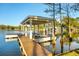 Lakefront dock with spacious seating area at 7 1 St Ct, Windermere, FL 34786