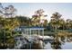 Private boat dock with covered seating area at 7 1 St Ct, Windermere, FL 34786