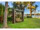 Relaxing lakeside swing set under a pergola at 7 1 St Ct, Windermere, FL 34786