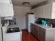 Cozy kitchen with updated countertops and gray cabinets at 71 Brooks Dr, Ormond Beach, FL 32176