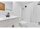 Clean bathroom with tub, white vanity, and updated toilet at 712 Jason Dr, Lady Lake, FL 32159