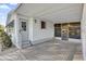 Covered entryway of a manufactured home with a screened-in porch at 712 Jason Dr, Lady Lake, FL 32159