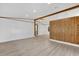 Spacious living room with light wood paneling and vinyl flooring at 712 Jason Dr, Lady Lake, FL 32159