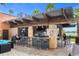 Outdoor community bar with seating, perfect for relaxing and socializing at 7383 Universal Blvd # 207, Orlando, FL 32819