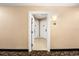 Apartment building hallway with doors to individual units at 7383 Universal Blvd # 207, Orlando, FL 32819