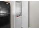 Laundry closet with a stackable washer and dryer at 7383 Universal Blvd # 207, Orlando, FL 32819