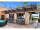 Inviting poolside bar area with ample seating, perfect for socializing and enjoying refreshments at 7383 Universal Blvd # 207, Orlando, FL 32819