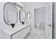 Modern bathroom with double vanity and marble flooring at 7615 Bay Port Rd # 36, Orlando, FL 32819