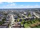 Aerial view of neighborhood with houses and landscape at 7654 Wilmington Loop, Kissimmee, FL 34747