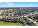 Aerial view of community with houses and pools at 7654 Wilmington Loop, Kissimmee, FL 34747