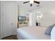 Spacious bedroom with a queen-size bed and en-suite bathroom at 7654 Wilmington Loop, Kissimmee, FL 34747