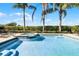 Inviting pool and spa with lounge chairs at 7654 Wilmington Loop, Kissimmee, FL 34747