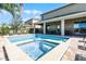 Private pool and spa with patio and lounge chairs at 7654 Wilmington Loop, Kissimmee, FL 34747