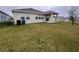 Large backyard with grassy area at 807 Ofanto Way, Haines City, FL 33844