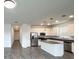 Modern kitchen with stainless steel appliances and island at 807 Ofanto Way, Haines City, FL 33844