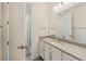 Clean bathroom boasts a vanity with a sink and a shower at 8558 Morehouse Dr, Orlando, FL 32836