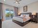 Spacious bedroom with private balcony access at 900 Jack Nicklaus Ct, Kissimmee, FL 34747