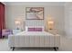 Bright bedroom with a comfortable bed and stylish decor at 900 Jack Nicklaus Ct, Kissimmee, FL 34747