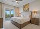 Luxury bedroom with private balcony and modern decor at 900 Jack Nicklaus Ct, Kissimmee, FL 34747