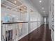 Bright hallway with hardwood floors and high ceilings at 900 Jack Nicklaus Ct, Kissimmee, FL 34747