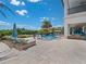 Luxury pool and patio area with lounge chairs at 900 Jack Nicklaus Ct, Kissimmee, FL 34747