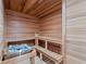 Relaxing wooden sauna with built-in benches at 900 Jack Nicklaus Ct, Kissimmee, FL 34747