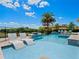 Resort-style pool with spa and comfortable lounge chairs at 900 Jack Nicklaus Ct, Kissimmee, FL 34747