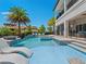 Luxury pool with spa, fountains and ample lounge space at 900 Jack Nicklaus Ct, Kissimmee, FL 34747