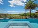 Stunning pool with hot tub overlooking a golf course at 900 Jack Nicklaus Ct, Kissimmee, FL 34747