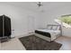 Bright bedroom with a plush carpet and plenty of natural light at 9138 Great Heron Cir, Orlando, FL 32836