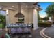 Modern outdoor kitchen with quartz countertops and stainless steel appliances at 9138 Great Heron Cir, Orlando, FL 32836