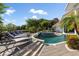 Resort-style pool with a spa and plenty of lounge space at 9138 Great Heron Cir, Orlando, FL 32836