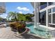 Luxury pool with spa and lake view at 9138 Great Heron Cir, Orlando, FL 32836