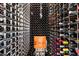 Extensive wine cellar with numerous bottles on display at 9138 Great Heron Cir, Orlando, FL 32836