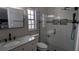 Updated bathroom with a large walk-in shower and modern fixtures at 9913 Janette Ln, Clermont, FL 34711