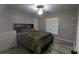 Spacious bedroom featuring wood-look floors and ample natural light at 9913 Janette Ln, Clermont, FL 34711