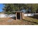 Block well house with a water tank and pump at 9913 Janette Ln, Clermont, FL 34711