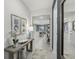 Bright and spacious entryway with a modern console table at 1212 White Ash Loop, Deland, FL 32720