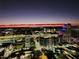 Night aerial view of the city skyline at sunset, with city lights illuminating the scene at 150 E Robinson St # 3104, Orlando, FL 32801